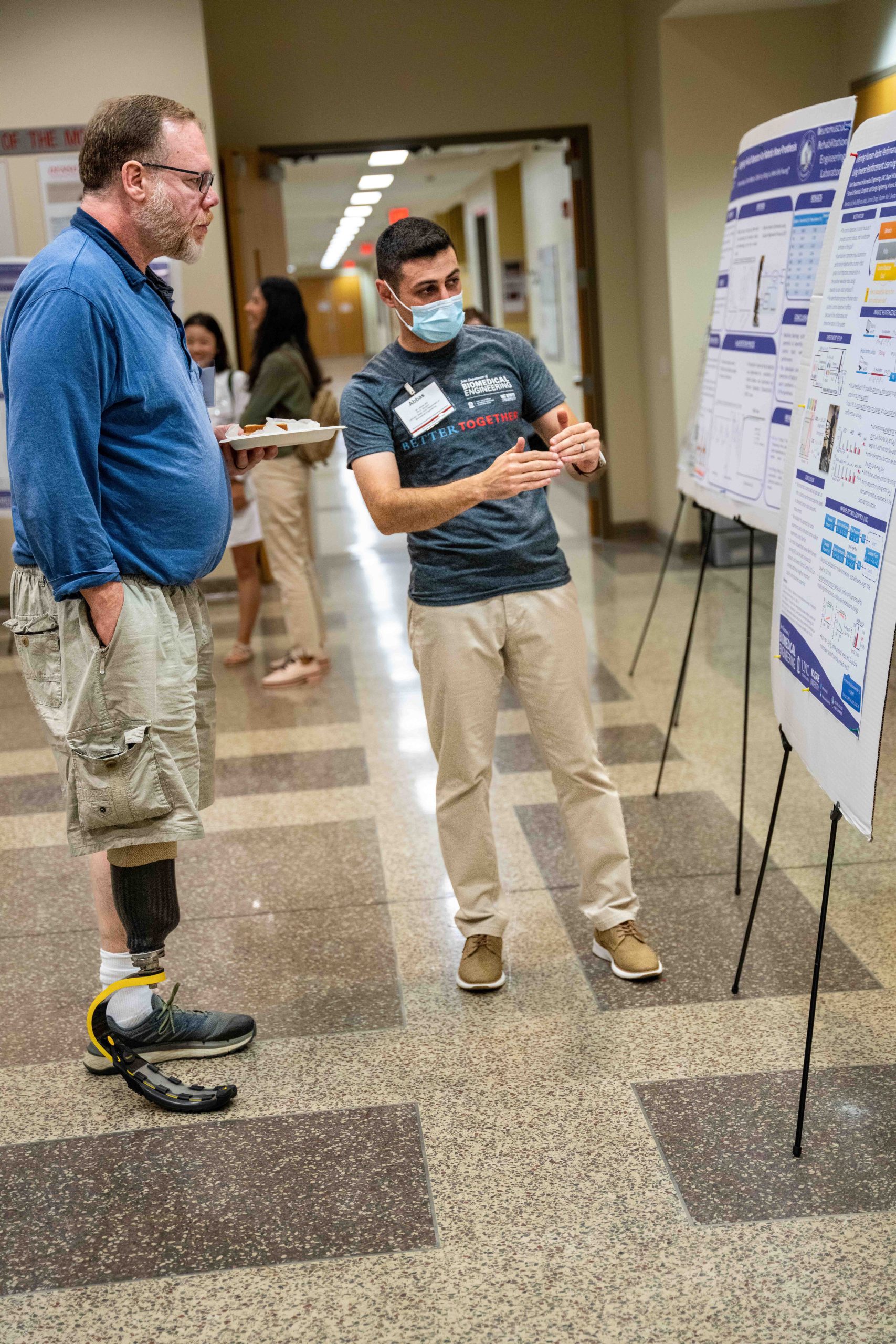 Student shows volunteer research presentation